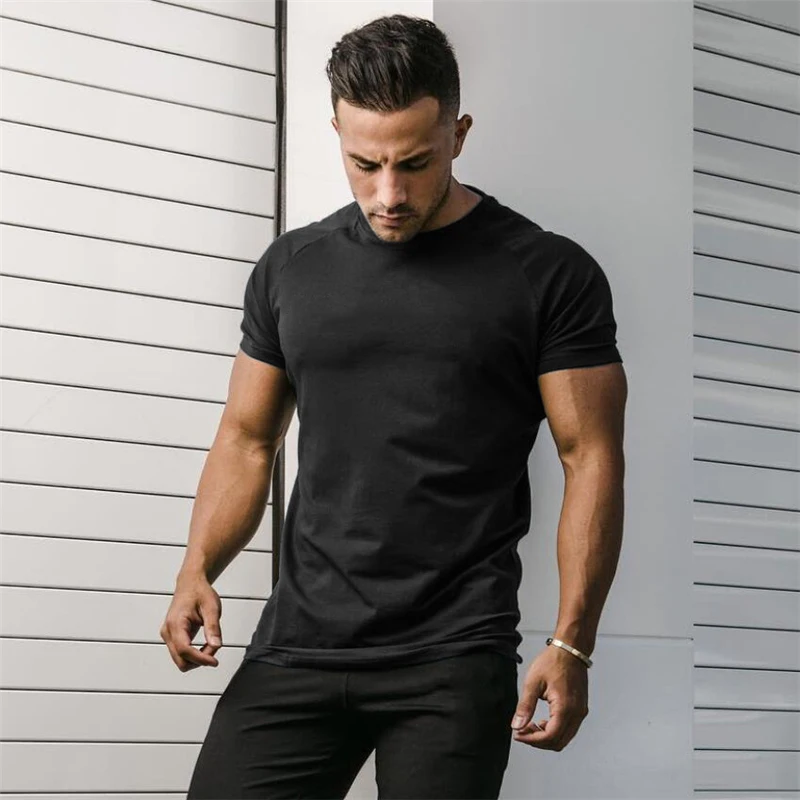 Muscle Tee Workout - เสื้อยืดผ้าคอตตอนสำหรับวิ่ง kemeja lengan pendek ระบายอากาศได้ดีสำหรับผู้ชายเสื้อผ้าฟิตเนสเพาะกายฤดูร้อน